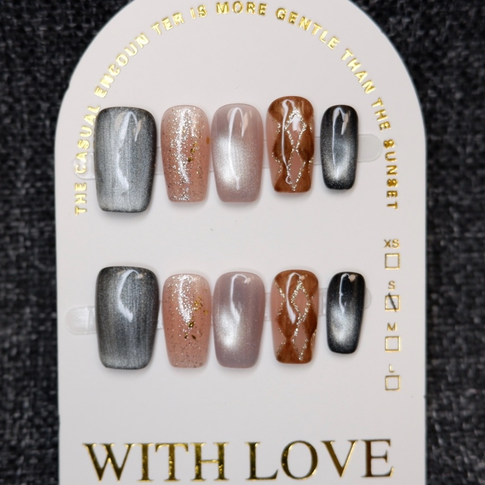 Elegant Nail Art Set with Glitter and Patterns